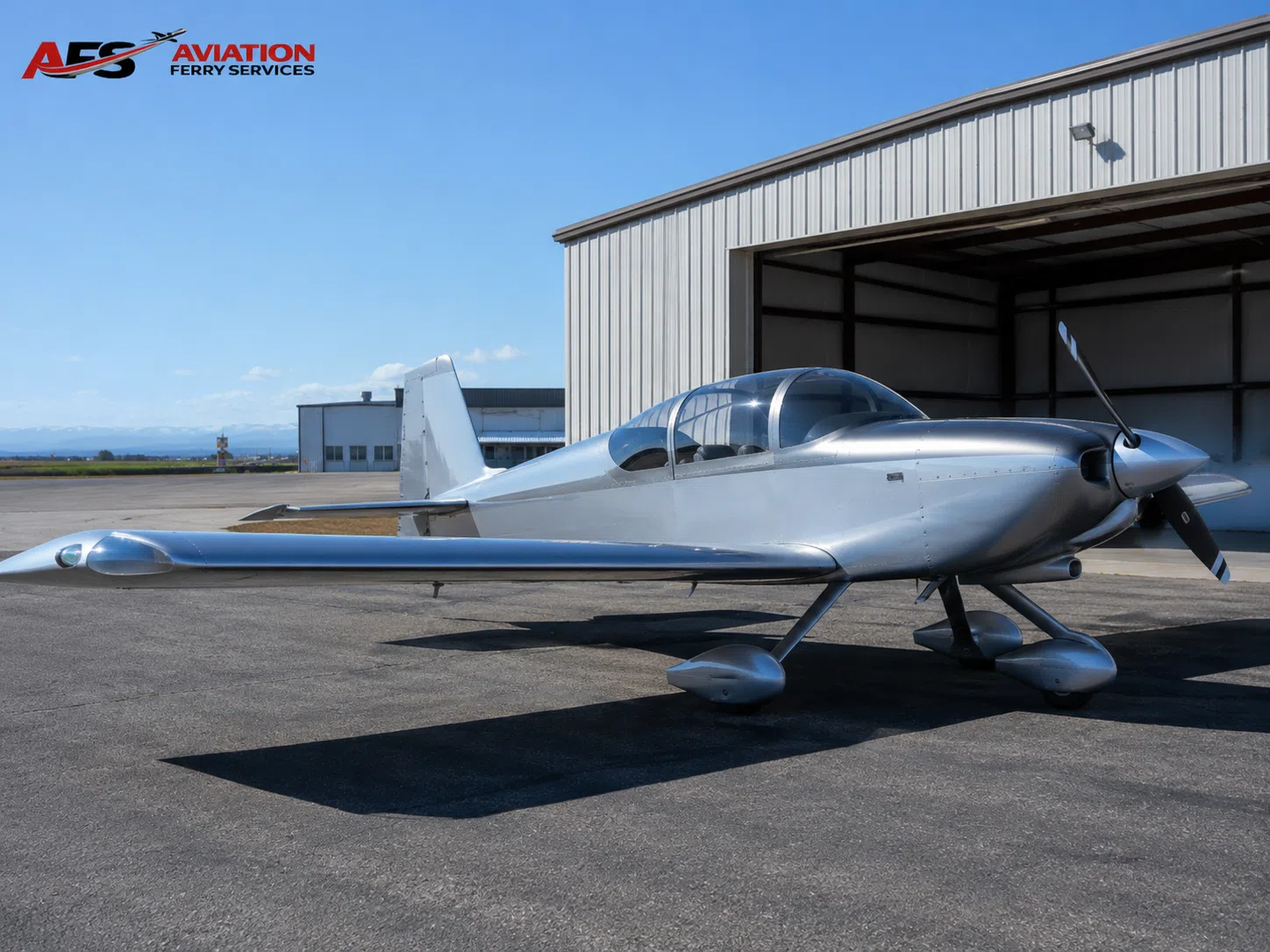 AFS aircraft photo — light aircraft on an airport ramp
