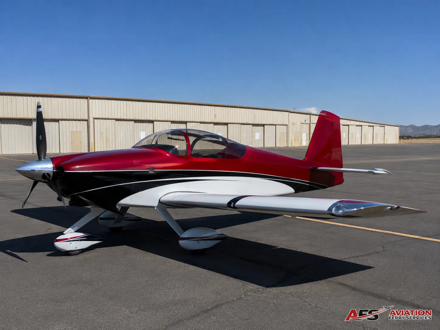 Experimental amateur-built low-wing aircraft parked on an airport ramp.