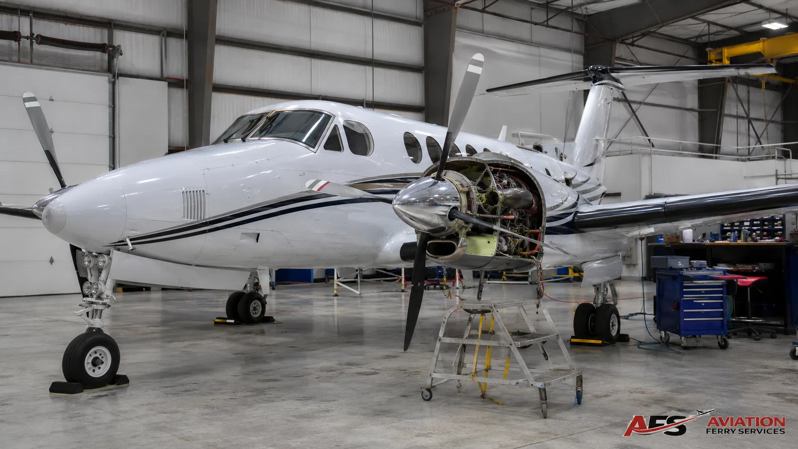 Aircraft inside a maintenance hangar.