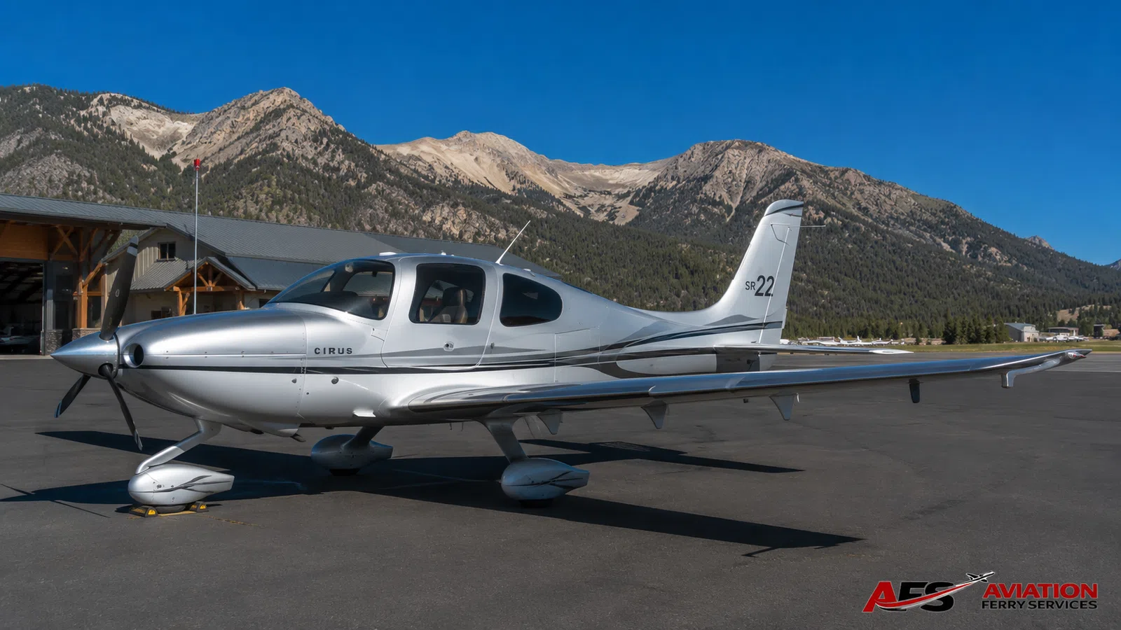 AFS aircraft photo — light aircraft with mountain terrain
