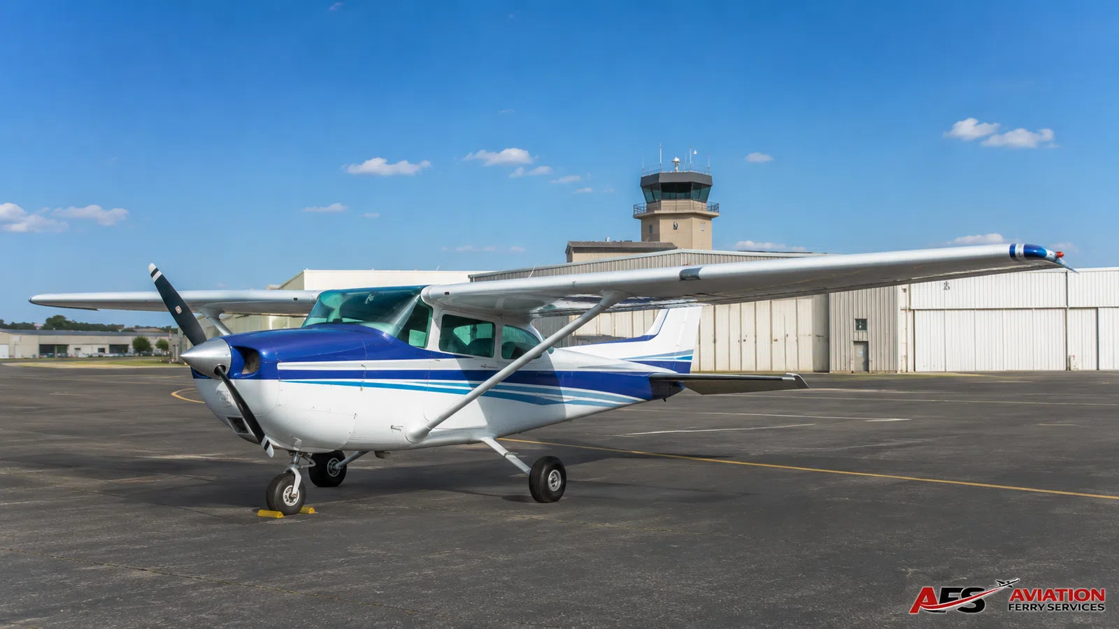 AFS aircraft photo — blue-and-white high-wing aircraft