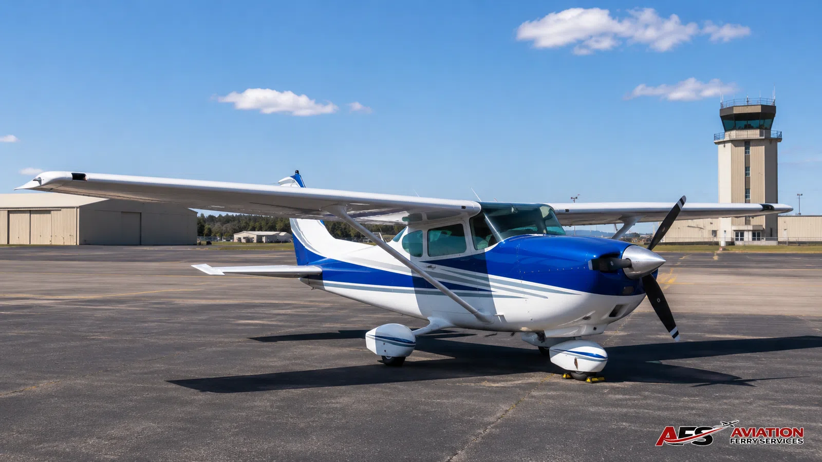AFS aircraft photo — high-wing aircraft at airport facility